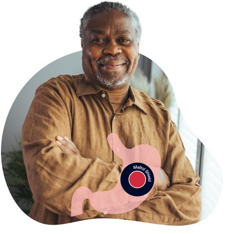 Man smiling with arms crossed and overlay of ACCRUFeR with maltol shield inside stomach