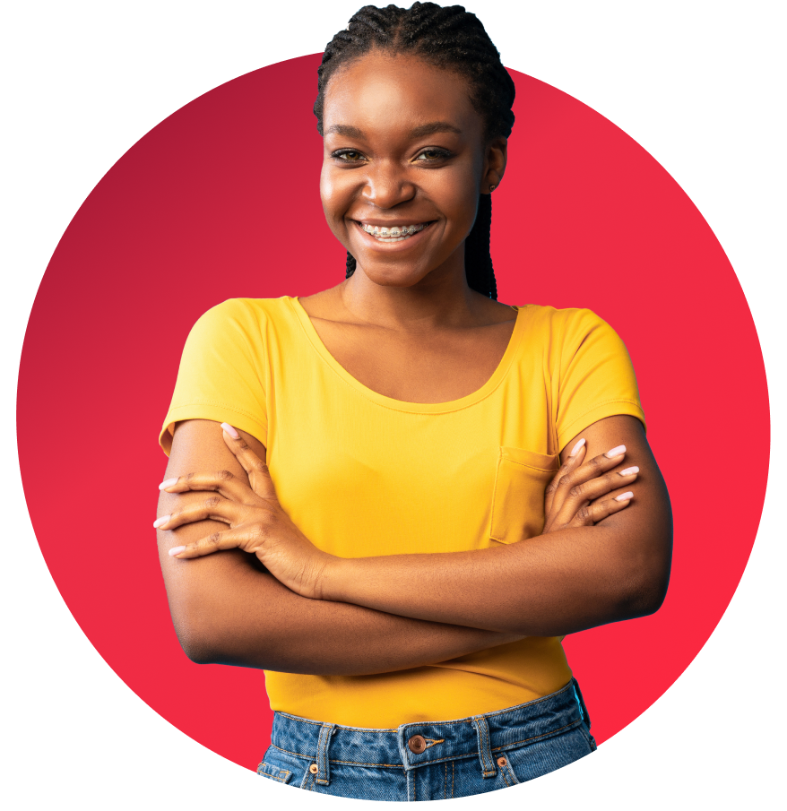 Teen girl smiling with her arms crossed