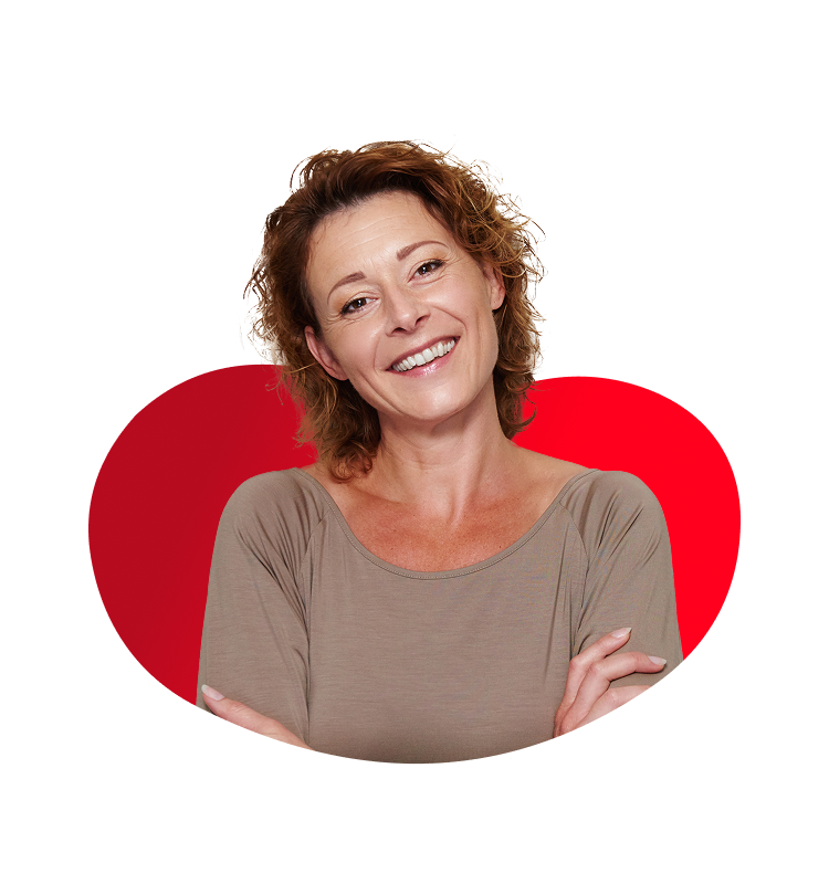 Woman smiling in front of a red background