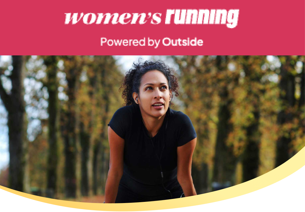 Woman resting after run underneath Women's Running logo 